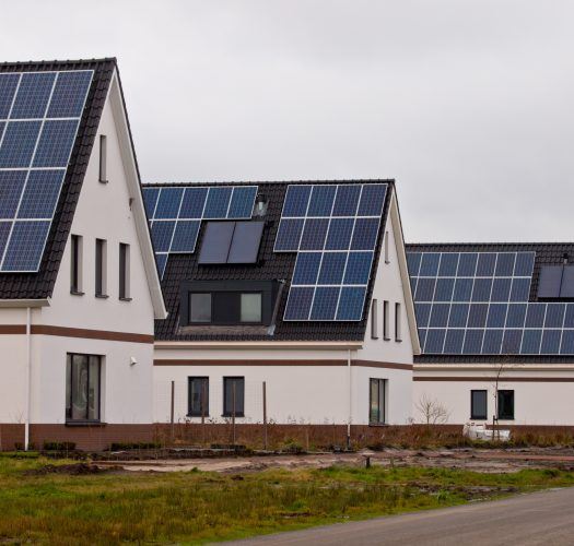 New Houses with Solar Panels in a Street