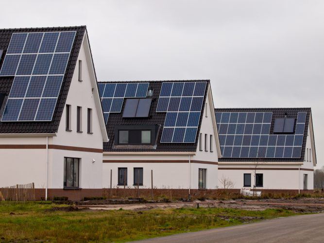 New Houses with Solar Panels in a Street